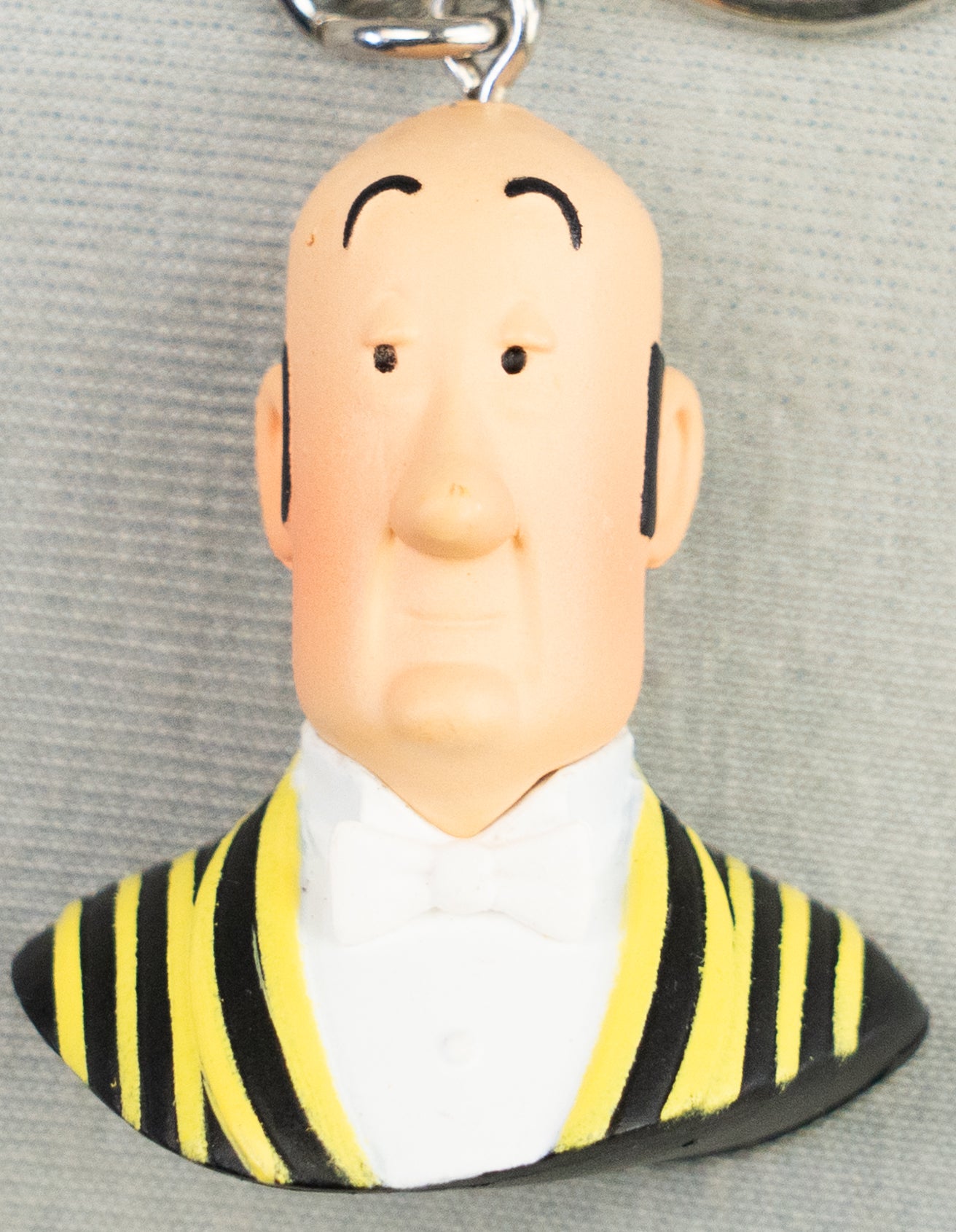 Moulinsart Toy Keyring: Nestor Bust 3.5cm Height 42321 Official Tintin Figure Key Ring