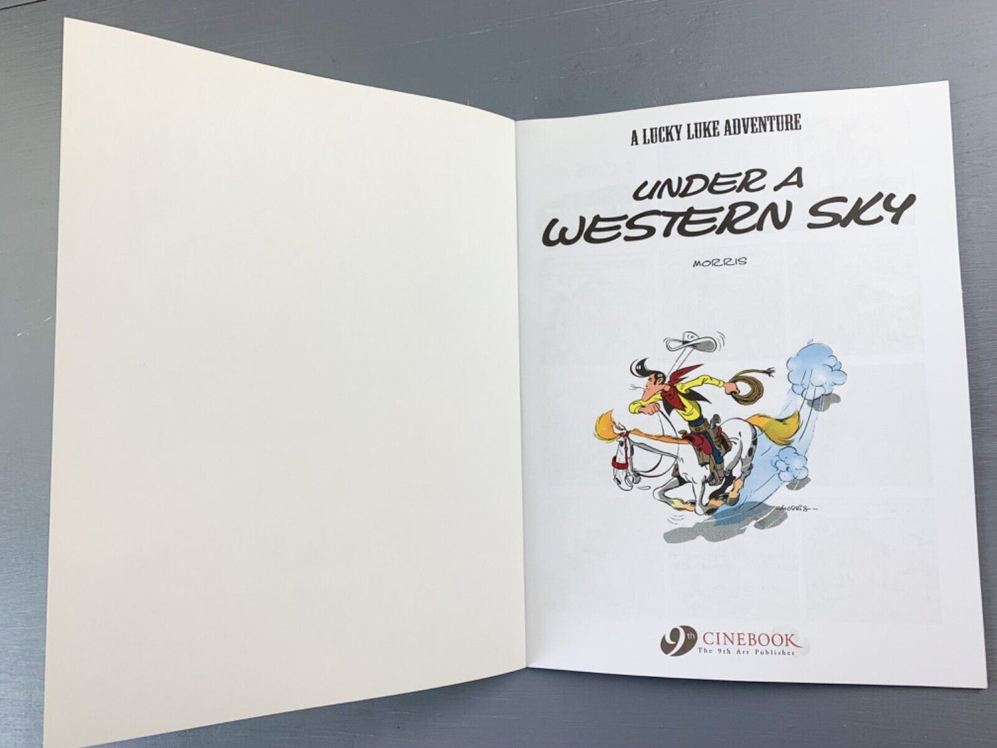 56 Under A Western Sky Lucky Luke Cinebook Paperback UK Comic Book