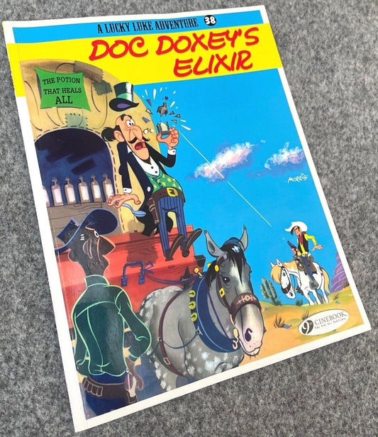38 Doc Doxey’s Elixir Lucky Luke Cinebook Paperback UK Comic Book