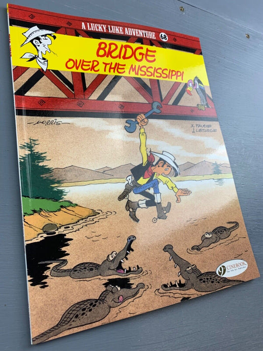 68 Bridge Over Mississippi Lucky Luke Cinebook Paperback UK Comic Book