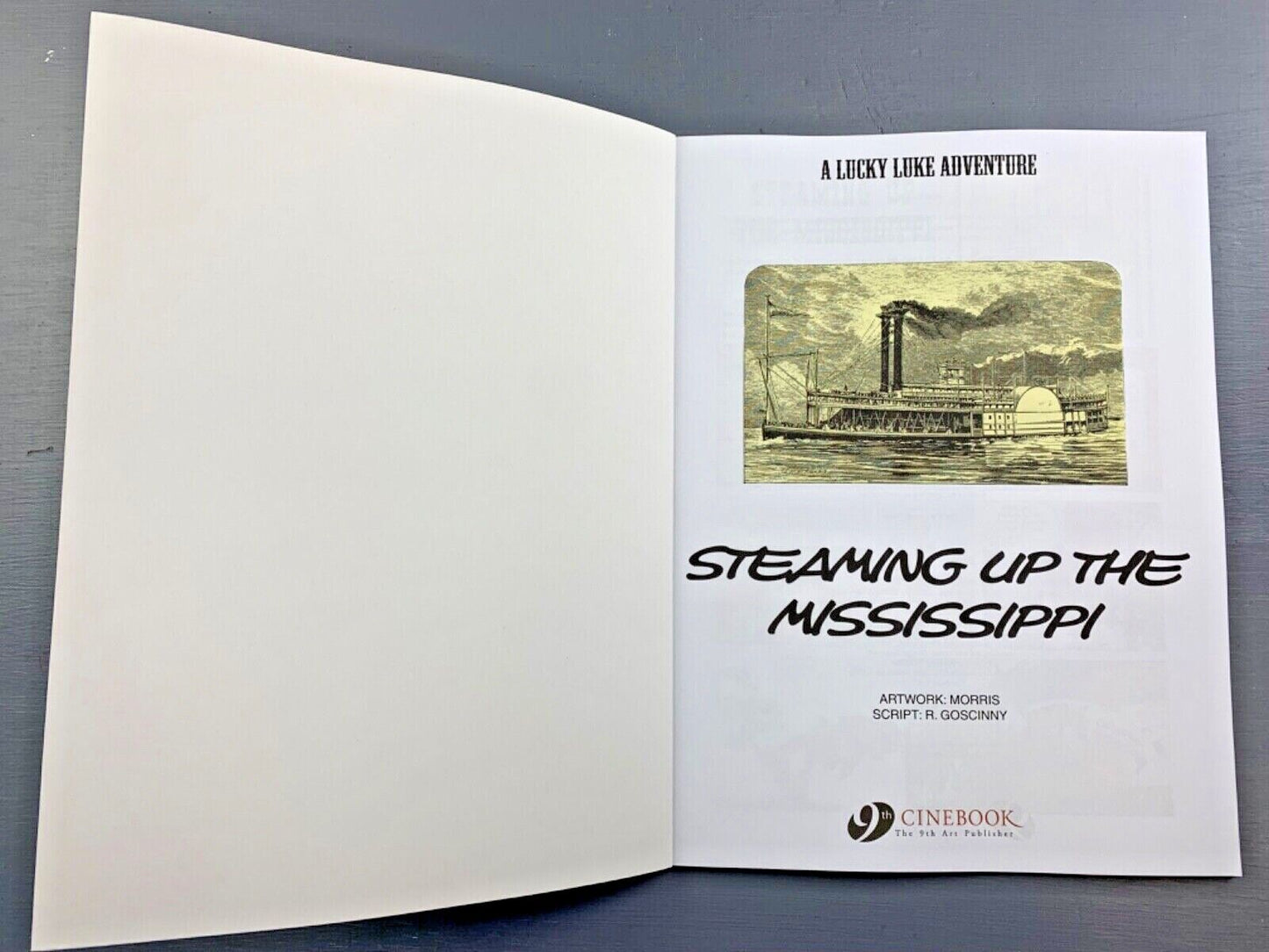 Lucky Luke Volume 79: Steaming Up the Mississippi - Cinebook Paperback UK Comic Book