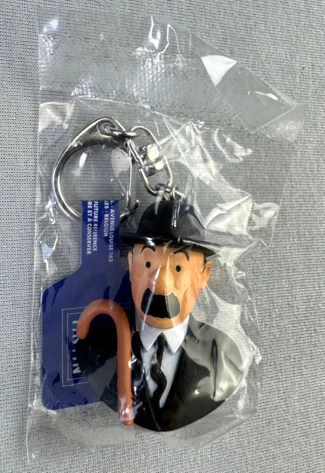 Moulinsart Toy Keyring: Tomson Bust 3.5cm Height 42318 Official Tintin Figure Key Ring