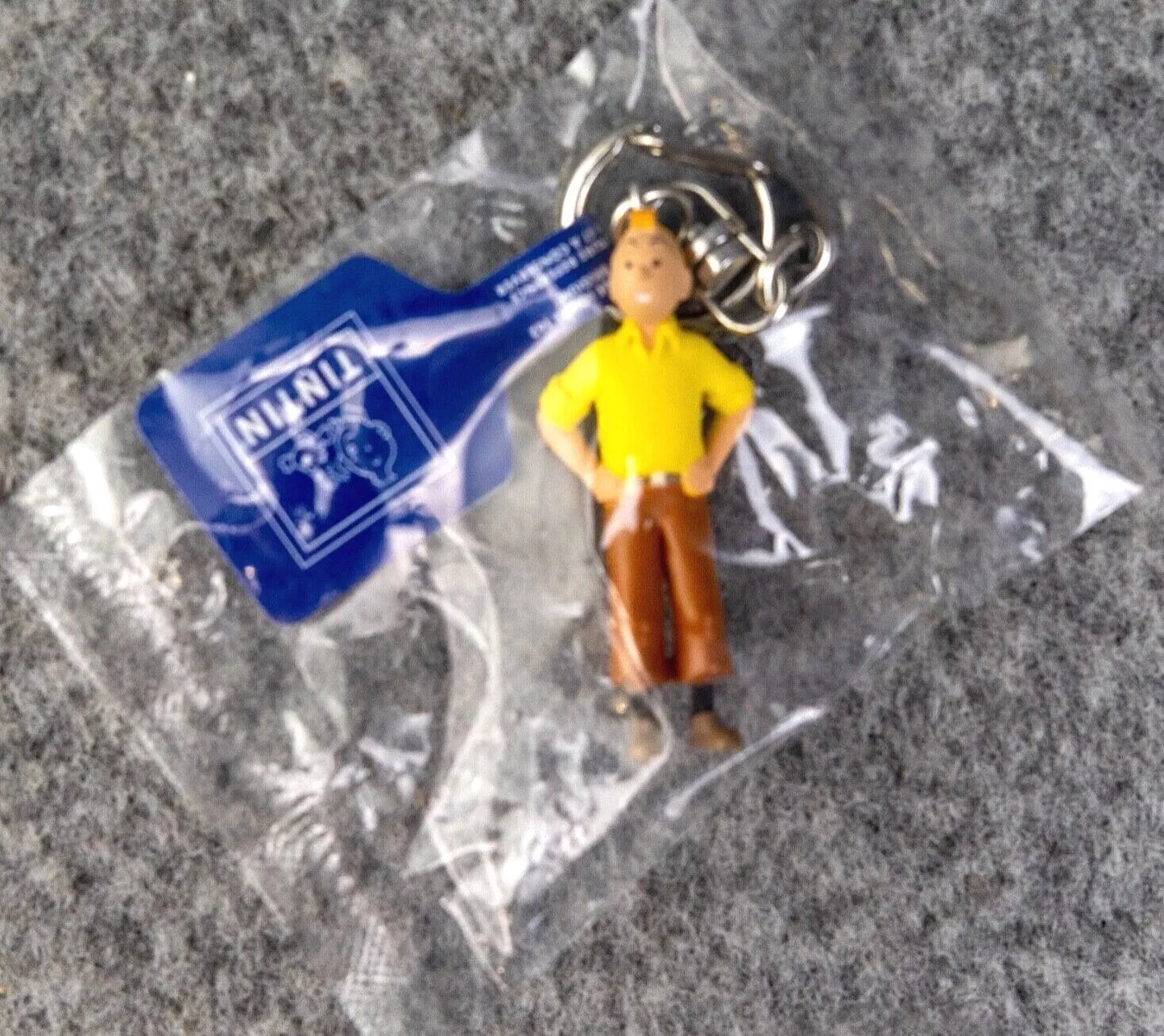 Moulinsart Toy Keyring: Tintin in Yellow 8cm Height 42466 Official Tintin Figure Key Ring
