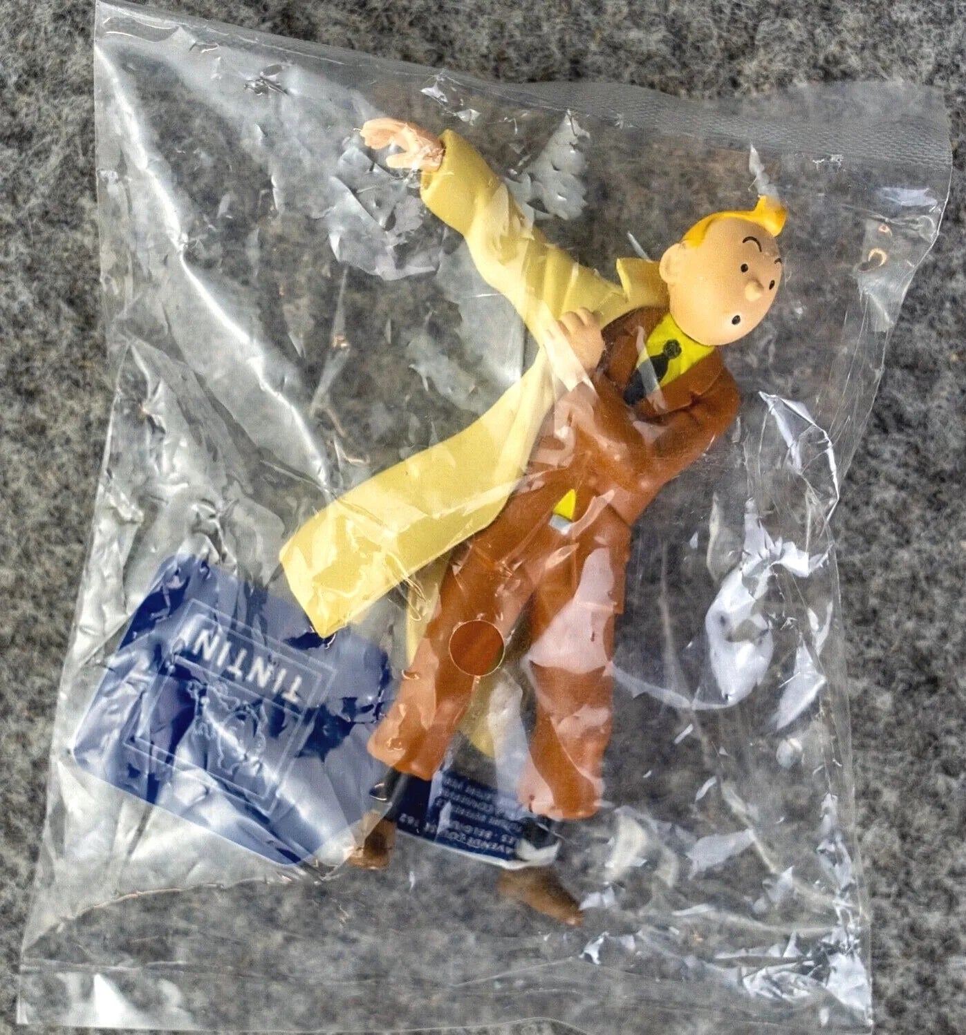 Moulinsart Model Figure Tintin - Putting on Coat 7cm 42473 ML Figurine 2009
