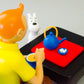 Statuette Moulinsart 47002 Tintin Drinking Tea: Blue Lotus 2023 Colorised 18cm Resin model