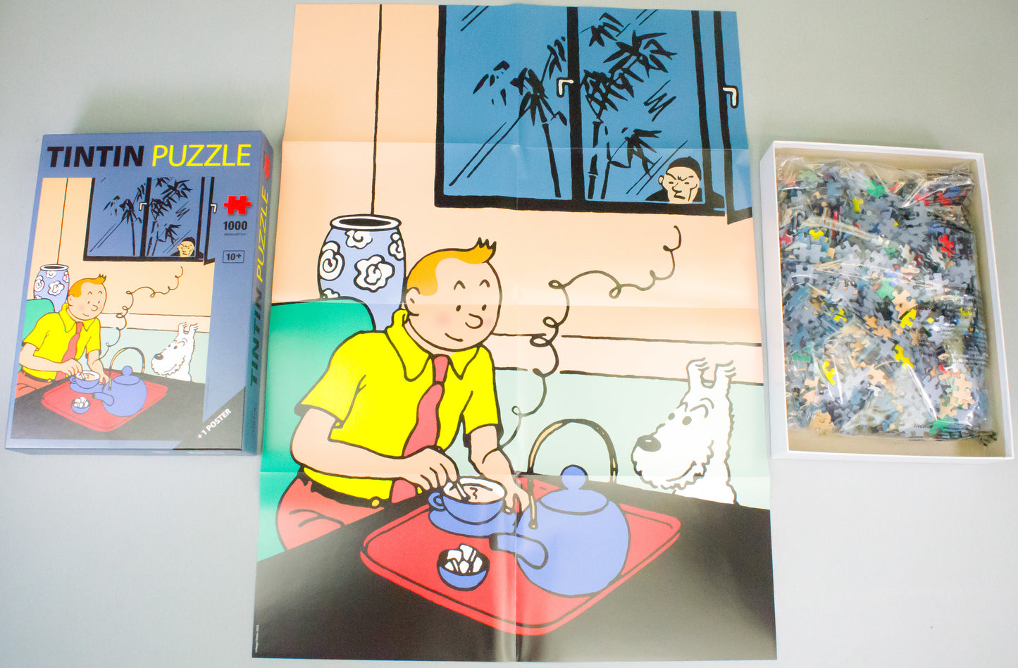 Moulinsart Tintin Puzzle (81559) - Tintin Drinking Tea (The Blue Lotus) 48x67cm