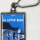 Moulinsart Tintin Title Cover Keyring 42526 -  Le Lotus Bleu Colourised Metal