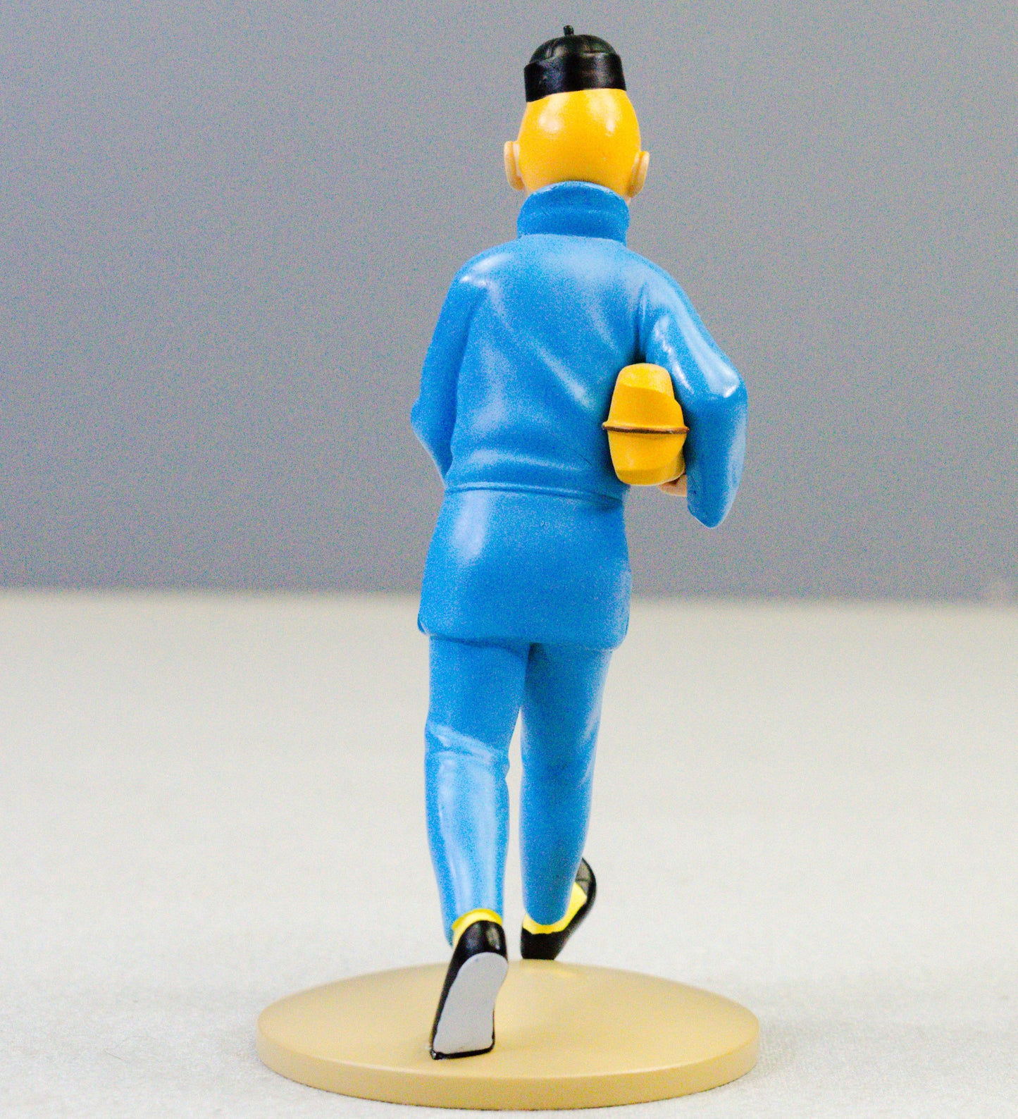 LTD RELEASE Tintin Figurine Moulinsart 42251 Tintin carrying Package: Blue Lotus 12cm Herge Figure