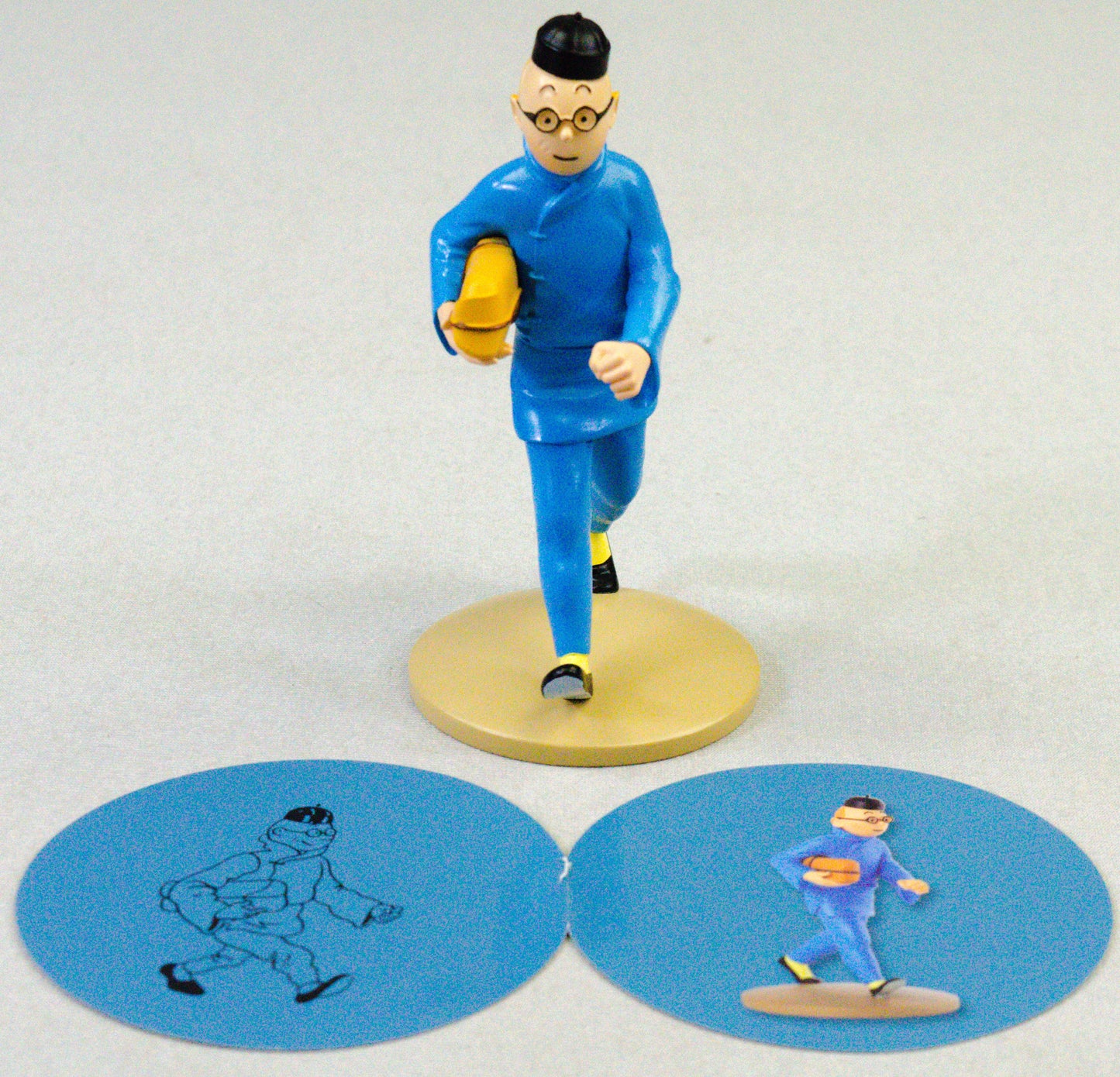 LTD RELEASE Tintin Figurine Moulinsart 42251 Tintin carrying Package: Blue Lotus 12cm Herge Figure