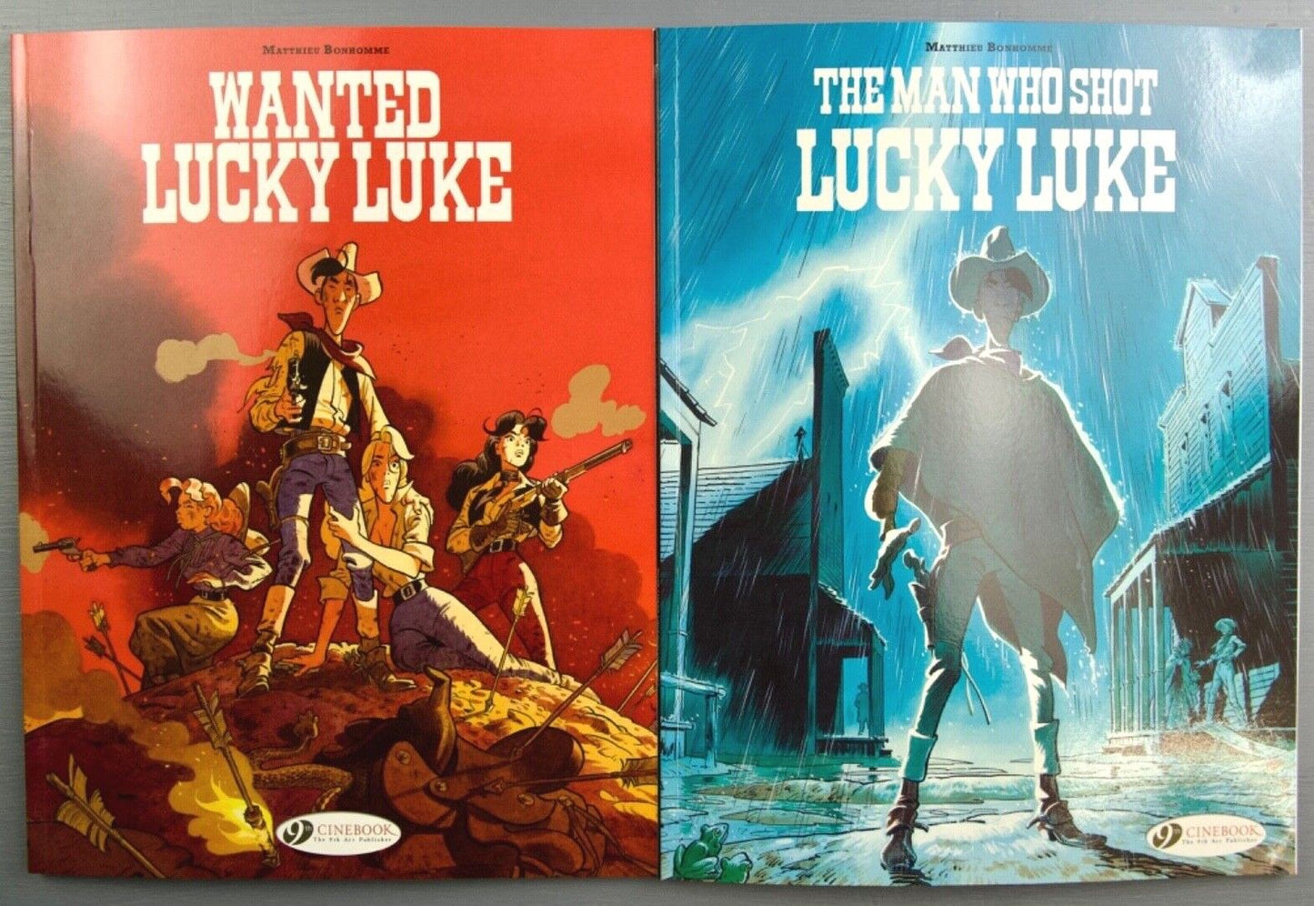 Lucky Luke Matthieu Bonhomme Set of 2 WANTED/Man Who Shot Cinebook Paperback Comic