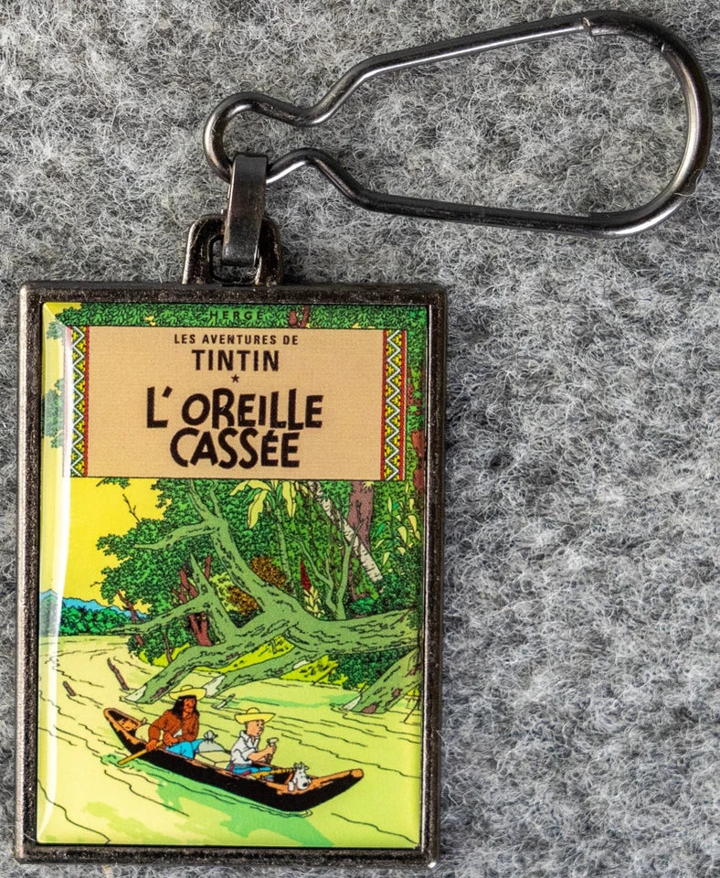 Moulinsart Tintin Title Cover Keyring 42527 - Tintin & the Broken Ear Metal
